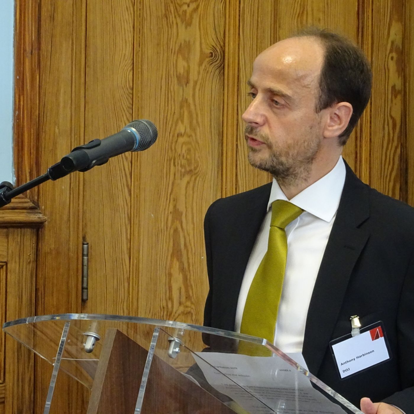 Department of Justice's Anthony Harbinson delivers opening remarks at #ModernSlavery conference episode artwork