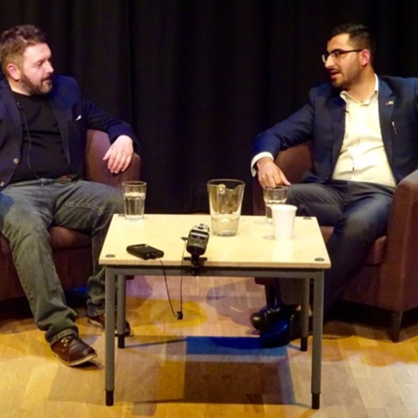 Gulwali Passarlay @GulwaliP in conversation with @WilliamCrawley after @AmnestyNI lecture  #BelFest episode artwork