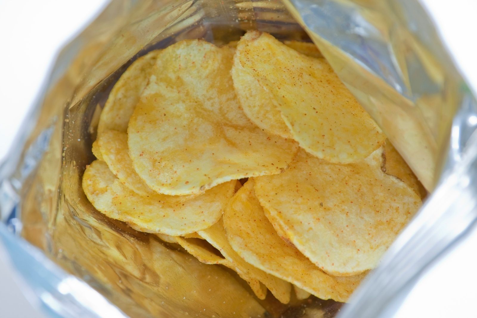 Картофельные чипсы в каком году придумали. Чипсы. Чипсы картинки. Абхазские чипсы. Чипсы в вакуумной упаковке картофельные.