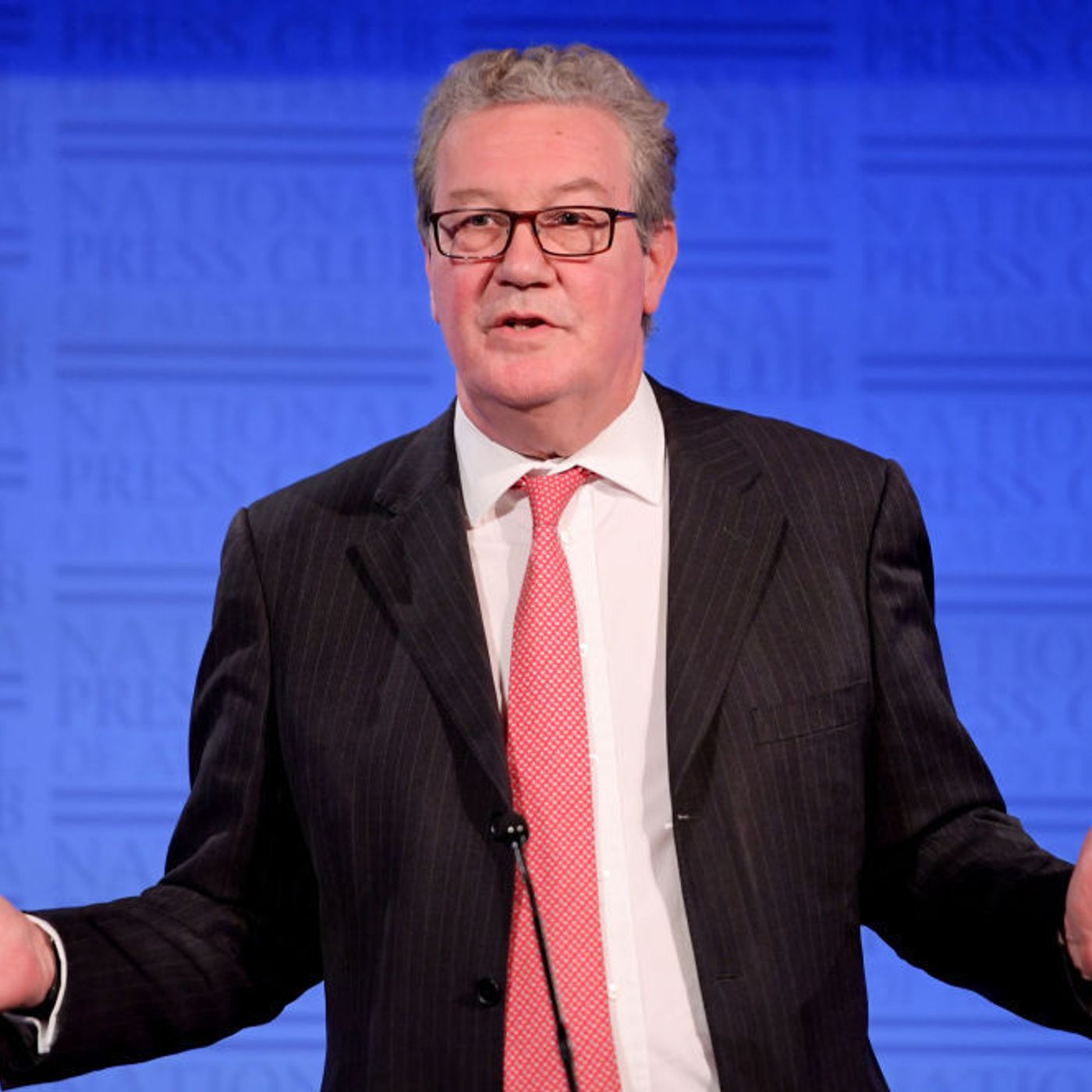 With Alexander Downer