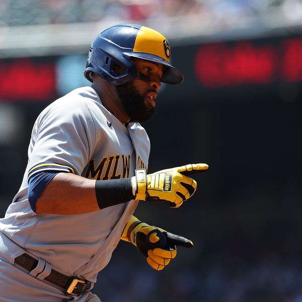 Brewers add Carlos Santana to roster, will bat third Saturday