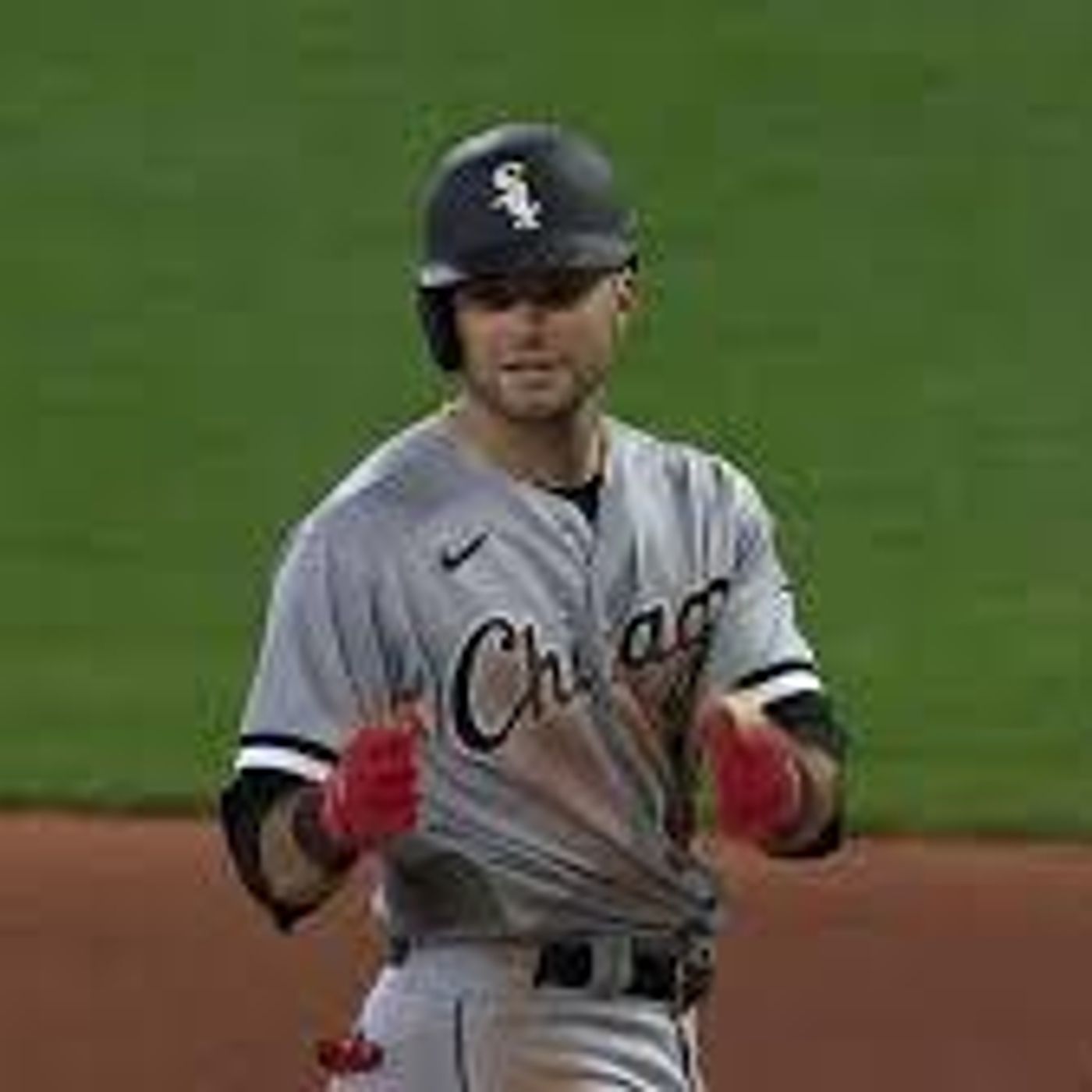 Andrew Benintendi White Sox engages in a one-on-one discussion with Coach Michael E