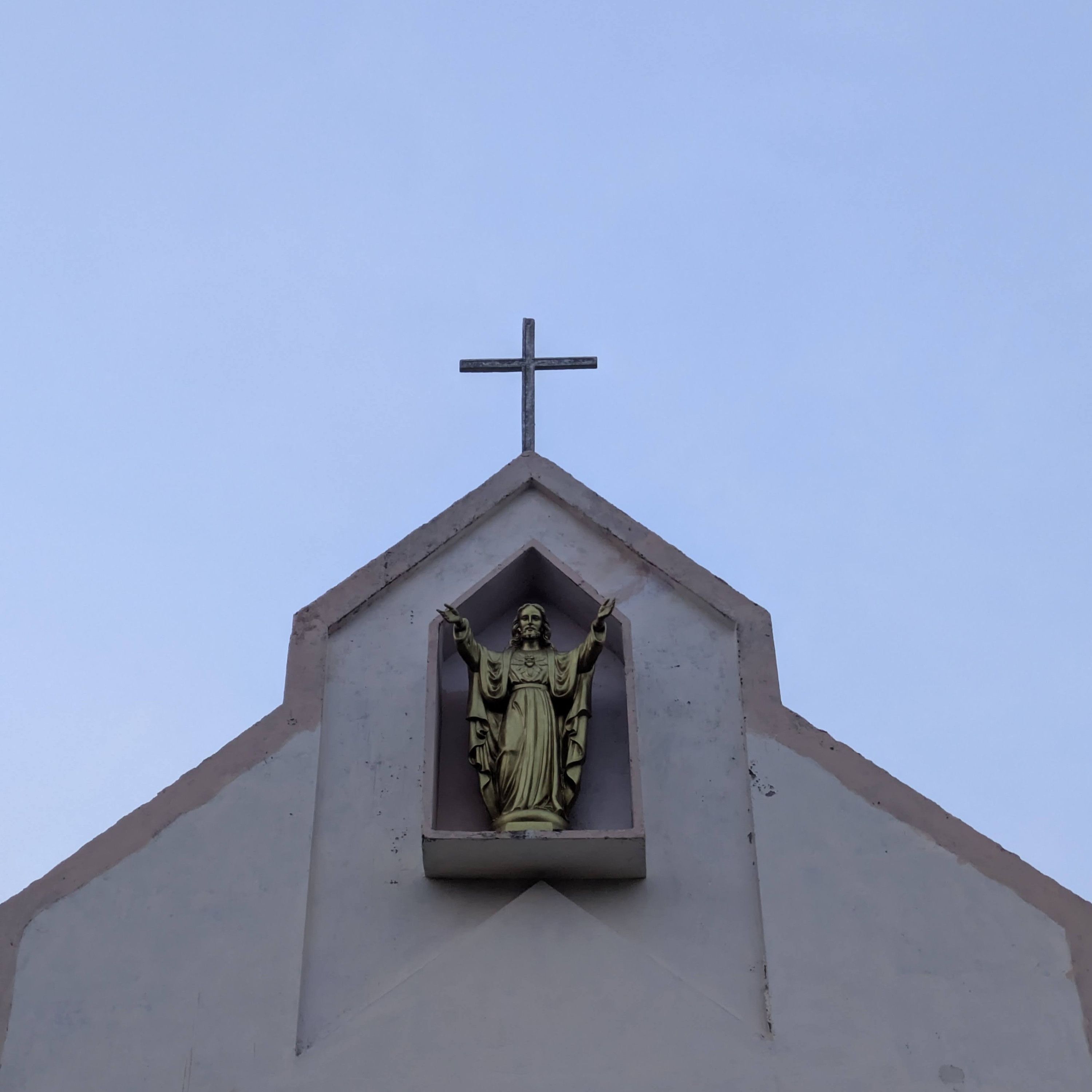 Standing outside a small church at night episode artwork