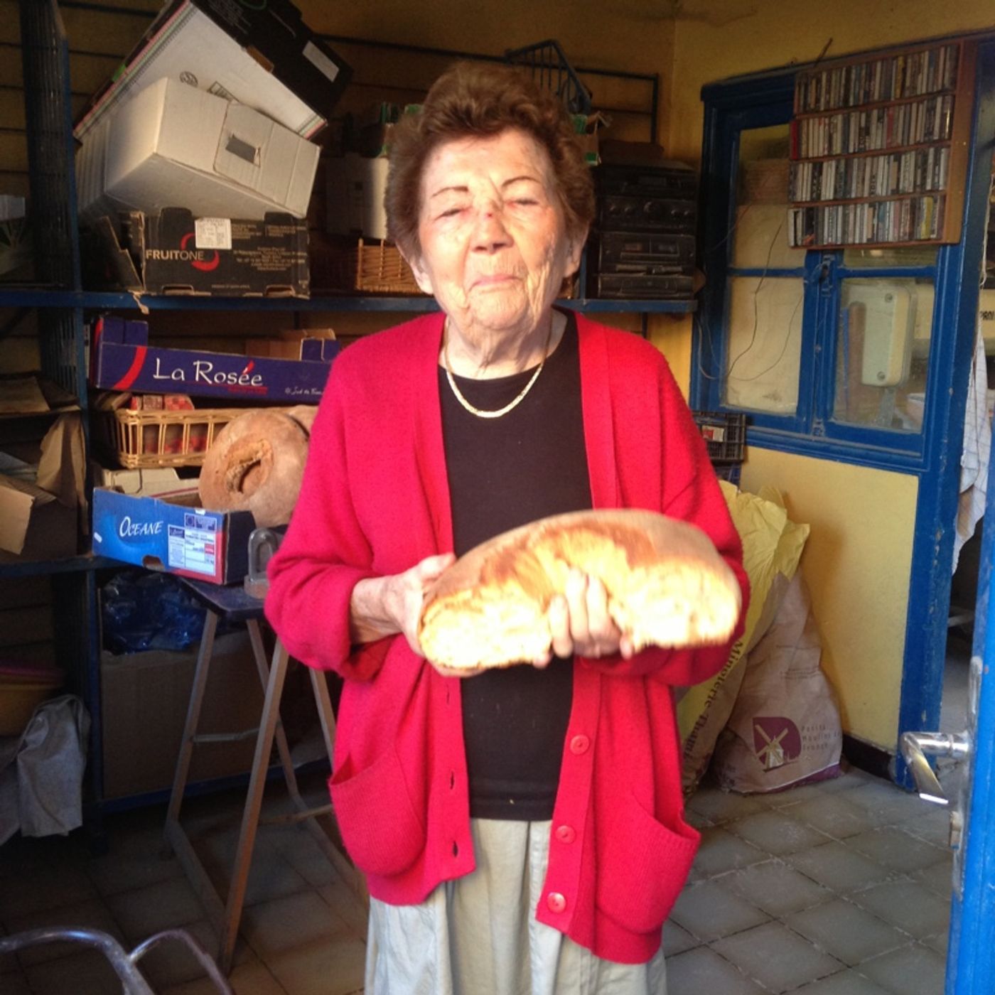 Chatting to the locals outside the bakery episode artwork